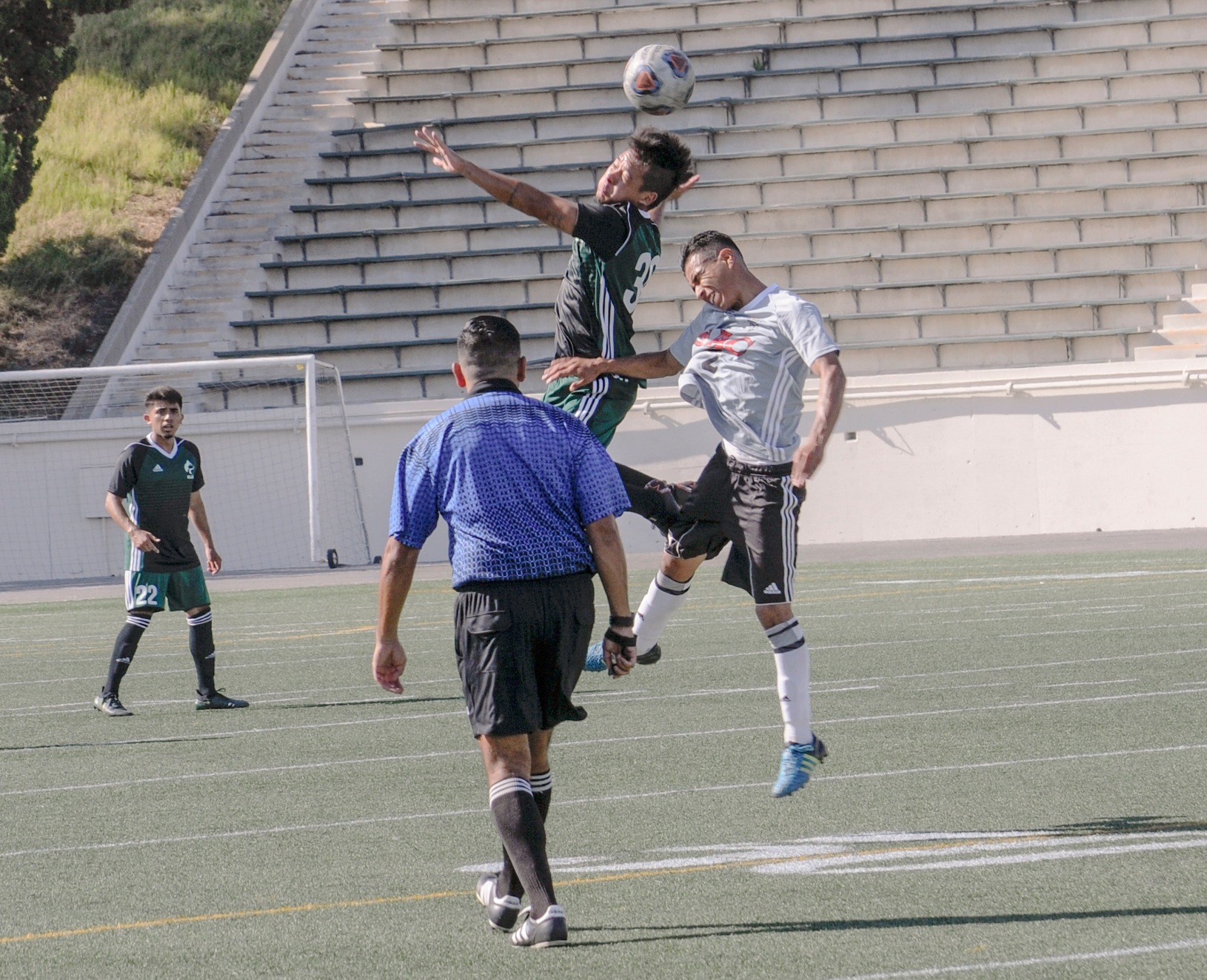 Freshman Paulo Macedo Nahasique of the East L.A. College men's soccer team is mid-air during a game earlier this season. (Photo by Tadzio Garcia)