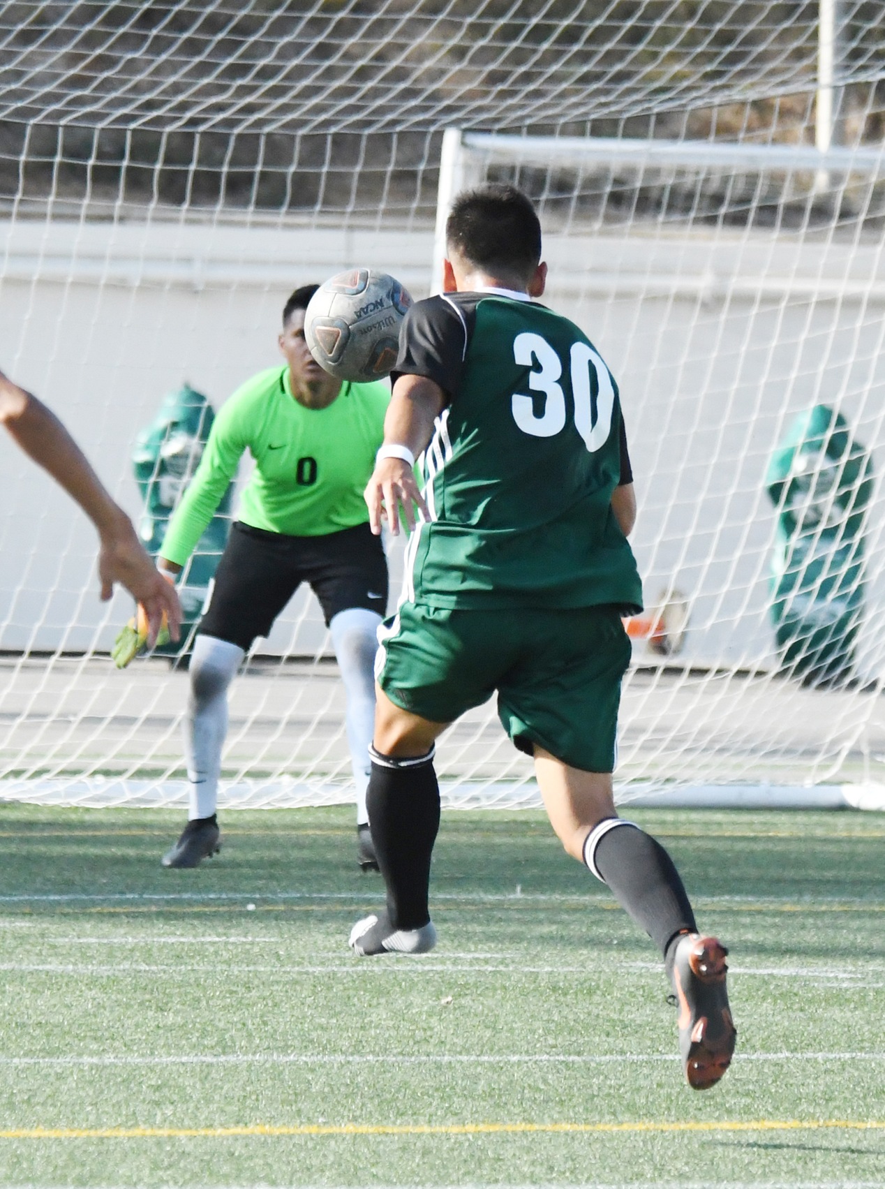 East L.A. College forward Paulo Macedo Nakashigue will take this assist from Alexis Arroyo (not pictured) and score without his left shoe which fell off at midfield in a 1-0 win over Rio Hondo College. (Photo by DeeDee Jackson)