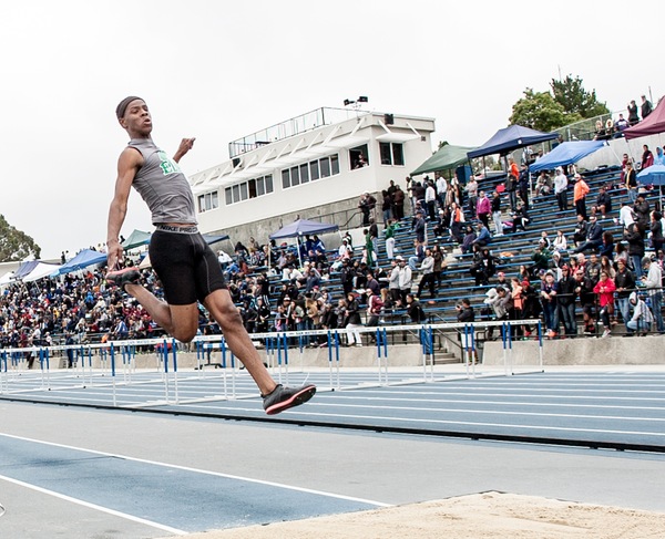East Los Angeles College men's T&F team took second through fourth places in the long jump won by BYU at the San Diego State University Aztec Open on March 23. Joshua Taylor placed second. The photo is from the 2015 state finals when he won All-American with this triple jump. (Photo by Tadzio Garcia)