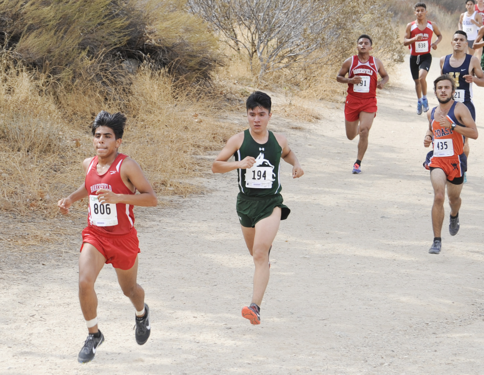 East Los Angeles College freshman Kevin Garcia keeps pace with Bakersfield's Culberto Salgado in the 2017 SoCal Cross Country Championship Preview Meet on Sept. 15. (Photo by Tadzio Garcia)