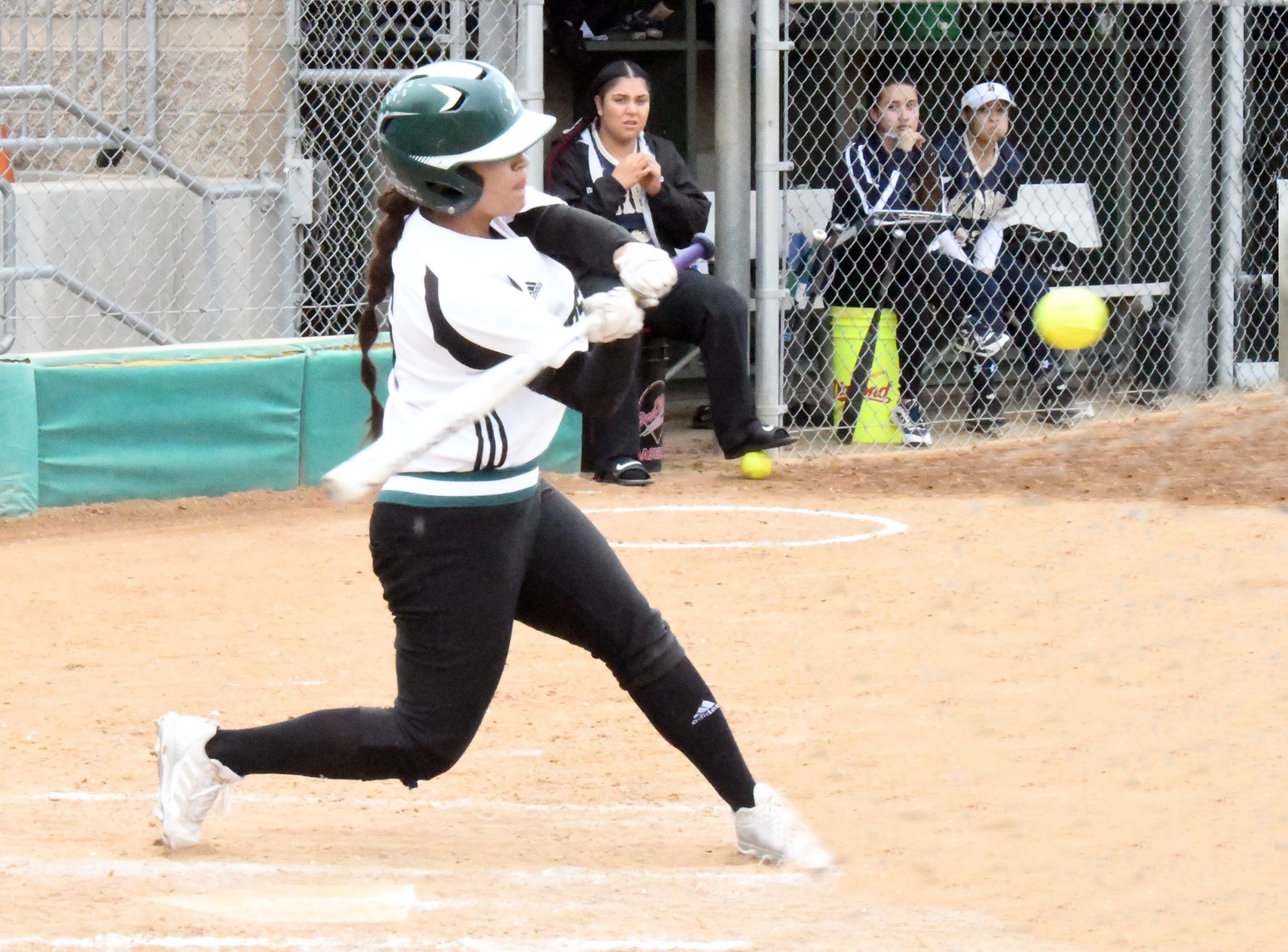 The East Los Angeles College softball team beat Compton College 15-7 in a 20-hit attack on Feb. 15. Catcher Destiny Avena, pictured, tripled with two runs batted in. (Photo by DeeDee Jackson)