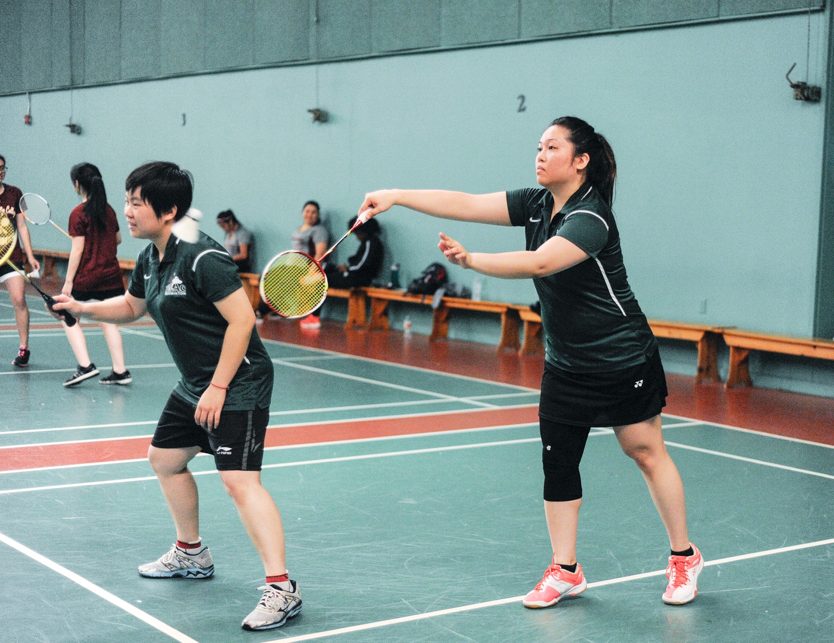 East Los Angeles College's top doubles team, the defending state champions and No. 8-seed at the State Badminton Championships, take it to the distance in a 21-14, 15-21, 21-19 loss to No. 2-seed Fresno City College at state. (Photo by Tadzio Garcia)