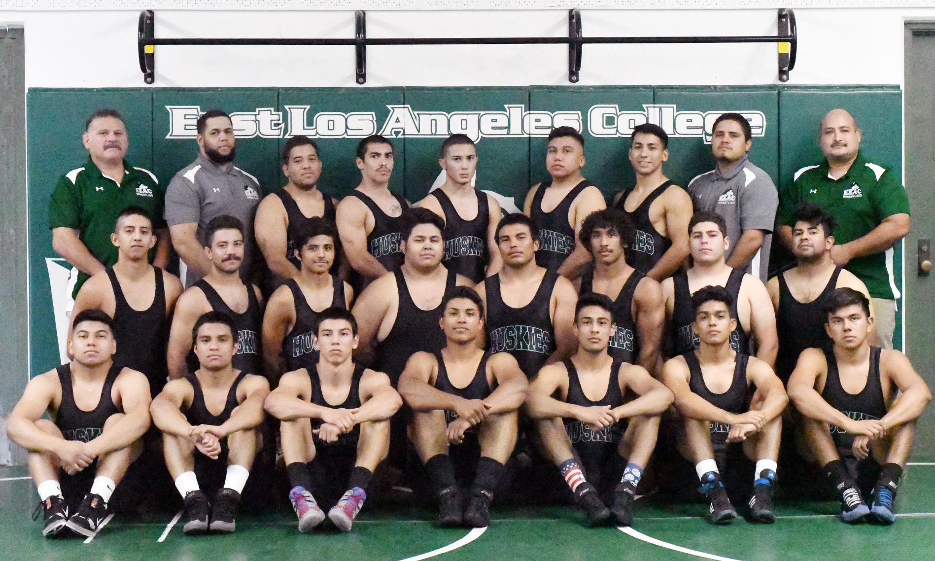 Ralph Valle with 2016-17 Wrestling Team