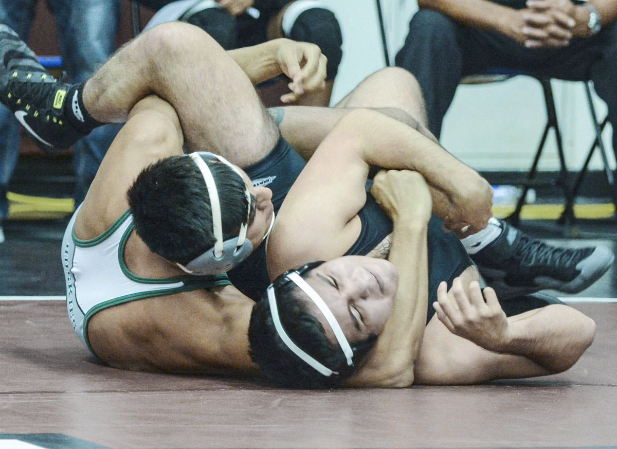 East Los Angeles wrestling sophomore Gabe Rodriguez won a 19-4 technical fall in the Huskies 32-17 loss to West Hills College Lemoore. Rodriguez is 6-1 overall. (Photo by Tadzio Garcia)