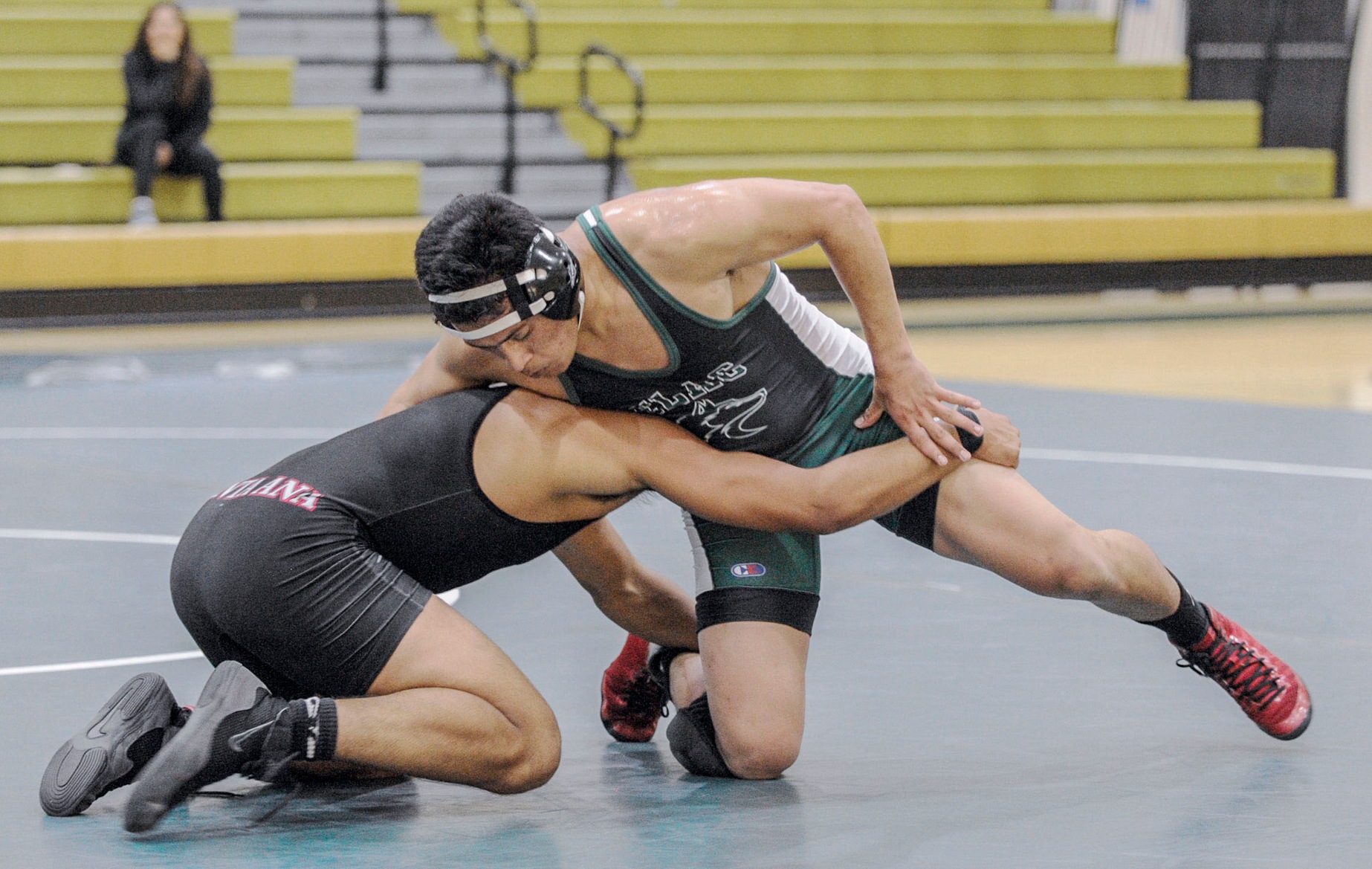 Emmanuel Zepeda wrestled to two pins and helped East Los Angeles College to a 12th place finish in the 24-team Santa Ana Tournament. (Photo by Tadzio Garcia)