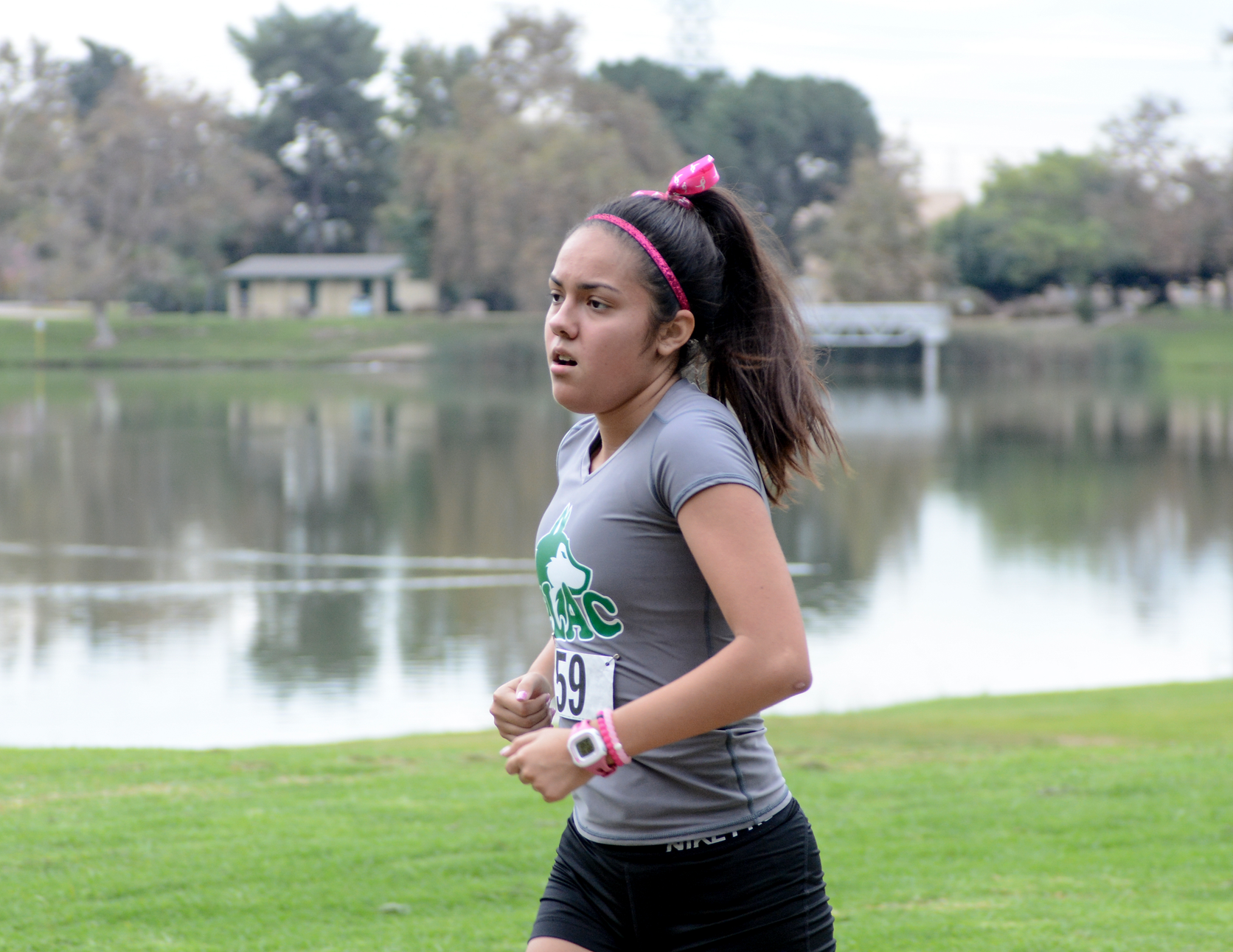 ELAC women's cross country freshman Ricki Gutierrez ends her first season with a personal best time at the South Coast Conference Championships, which ELAC hosted Oct. 28 at Legg Lake in South El Monte. (Photo by Tadzio Garcia)