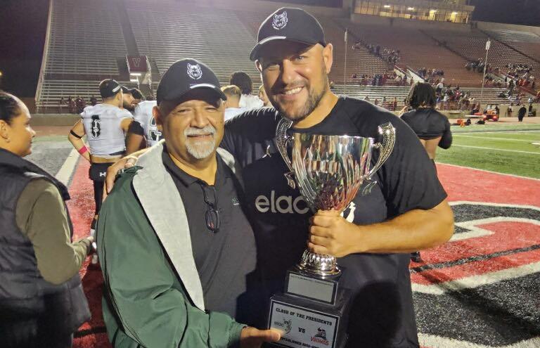 Godinez with Dean Urdiales after Huskies win 2nd Annual Clash of the Presidents' Cup at Long Beach CC last October.