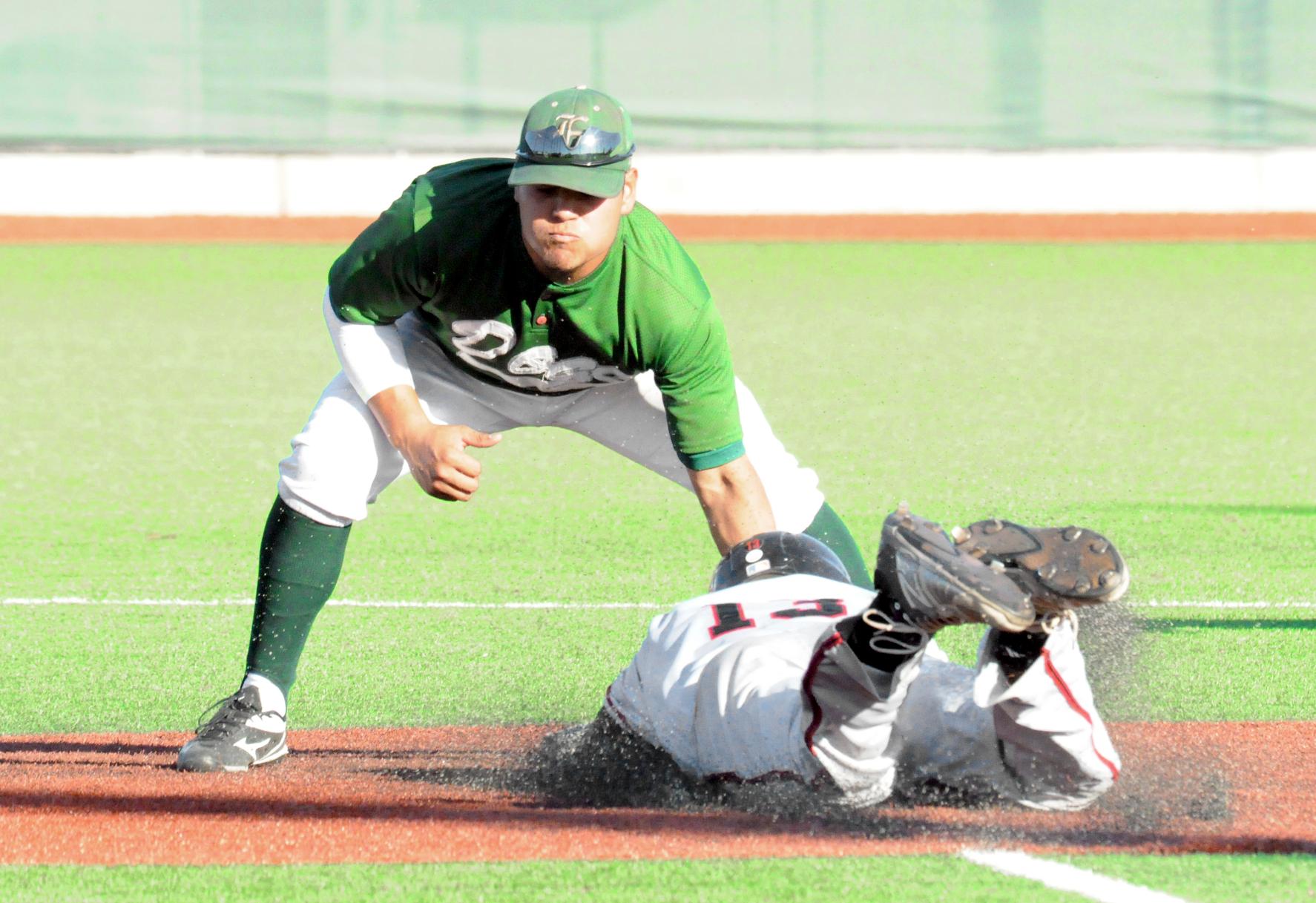 East Los Angeles College sophomore second baseman Johnny Salgado tags out Santa Barbara City College shortstop Alex Heim who was trying to steal second base in a Husky 5-1 loss on Feb. 16. (Photo by DeeDee Jackson)