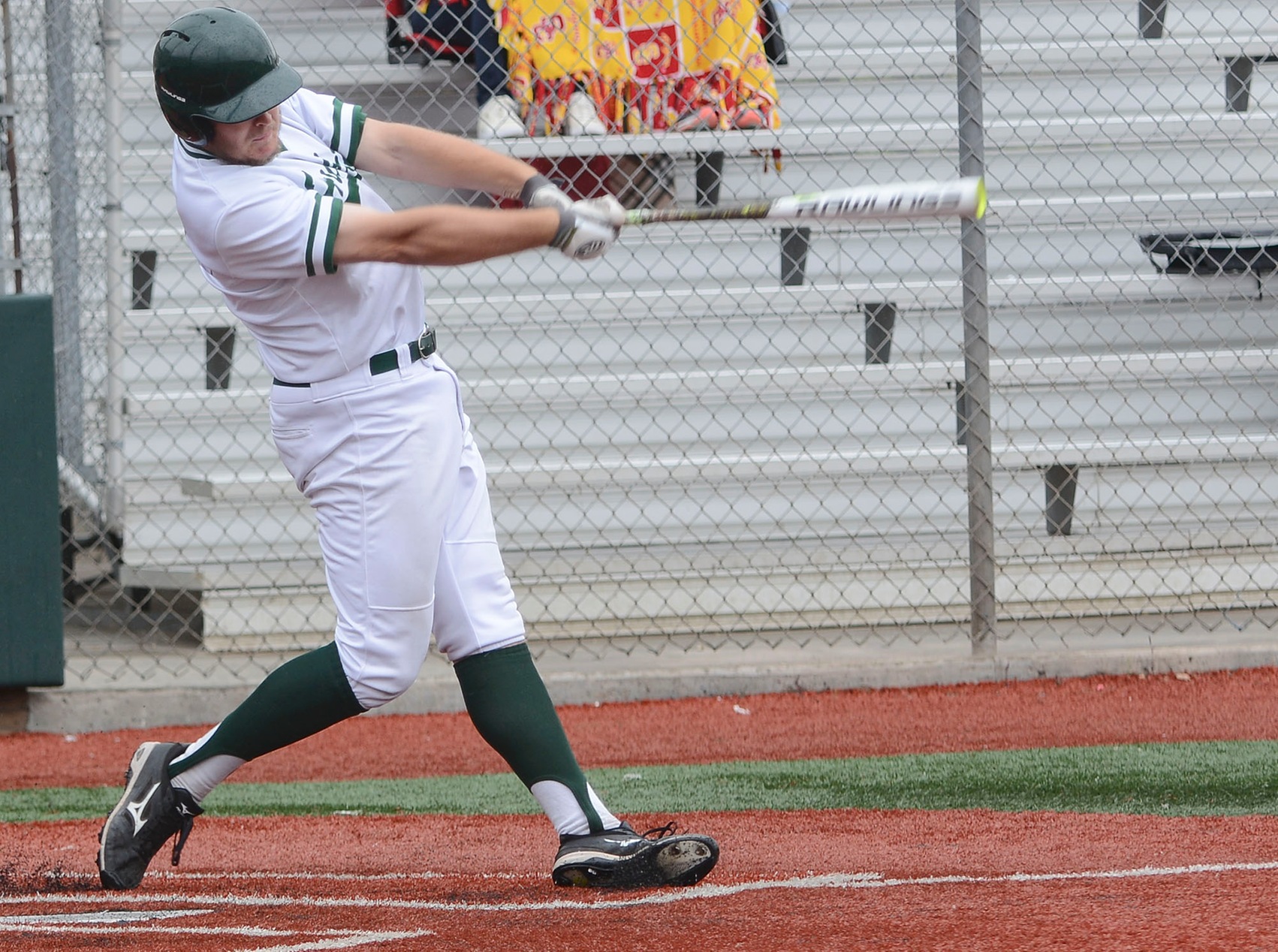 East Los Angeles College center fielder Kyle Francis hits a 2-RBI triple with this swing and added the winning sacrifice fly in a 6-5 win vs. Rio Hondo College. (Photo by Tadzio Garcia)