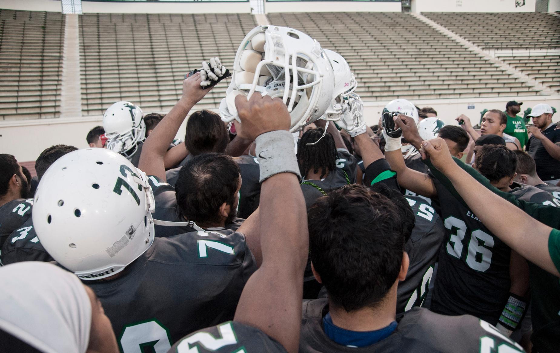 The East Los Angeles College football team comes together in their final huddle of the 2015-16 season.