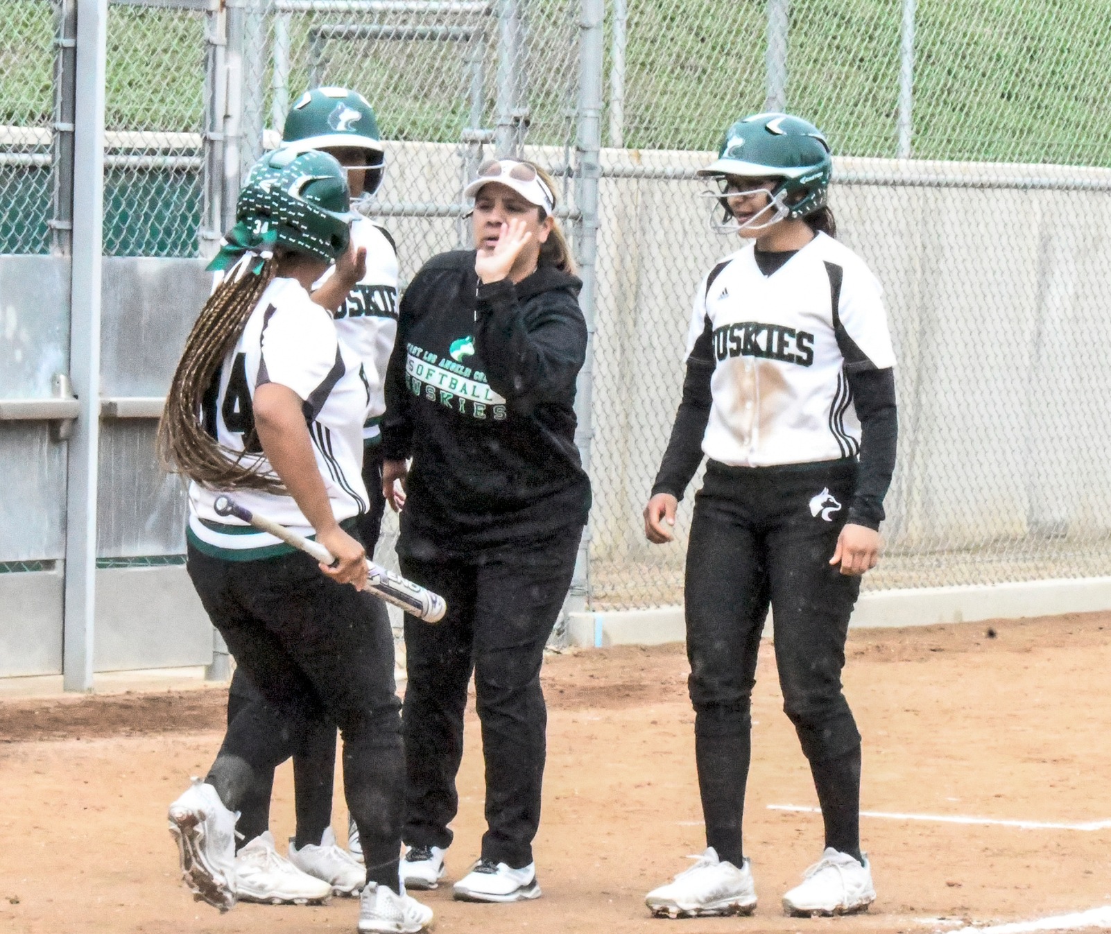 The Huskies softball team (6-8) lost a 2-1 pitching dual to No. 9 state-ranked Riverside City College (11-4) on February 26 at the Evans Sports Complex in Riverside. (Photo by DeeDee Jackson)