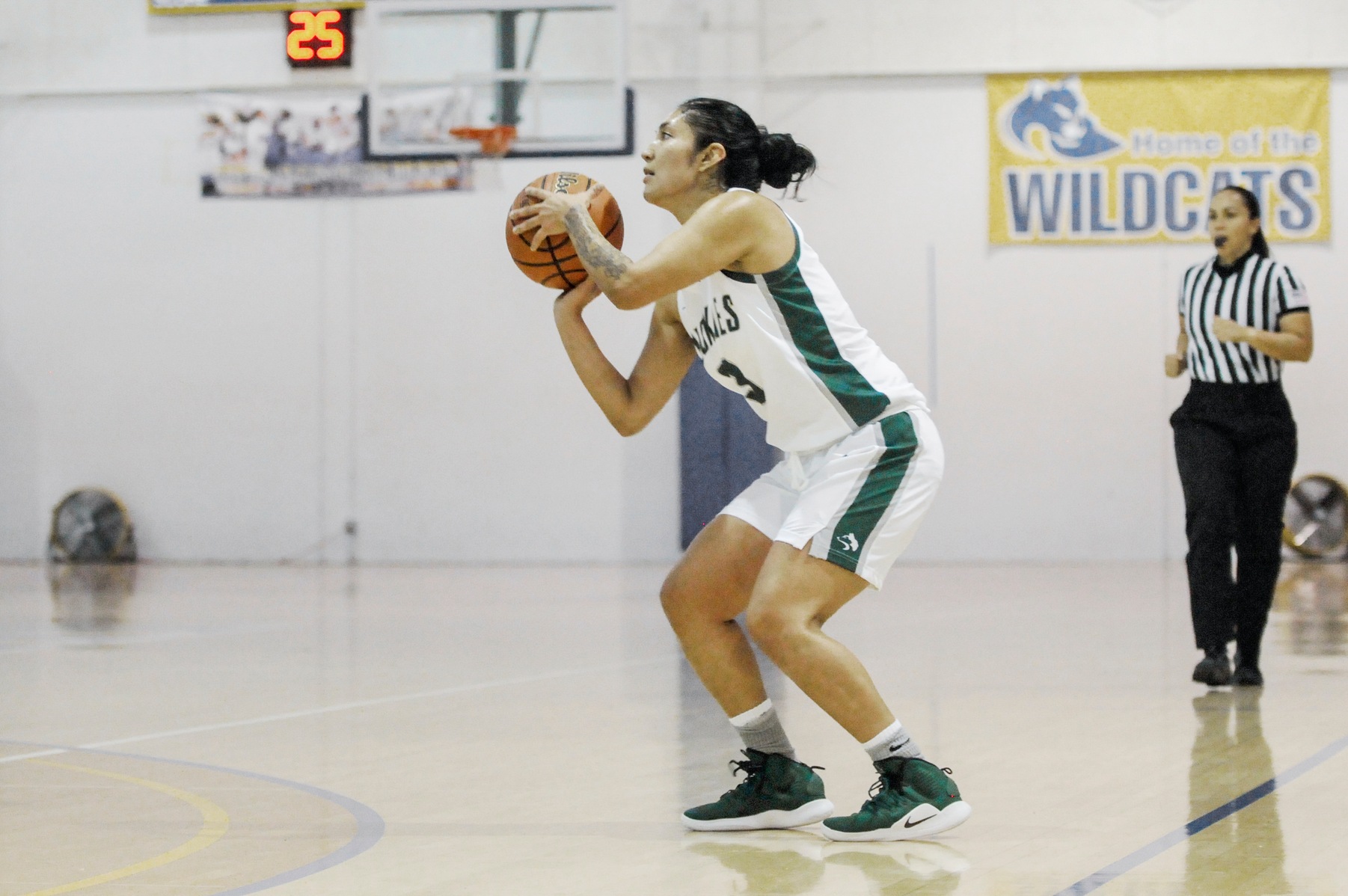 Guard Adriana Gonzalez of No. 8 East Los Angeles College, attempts a 3-pointer in a 76-57 win over No. 10 L.A. Valley College. (Photo by Tadzio Garcia)