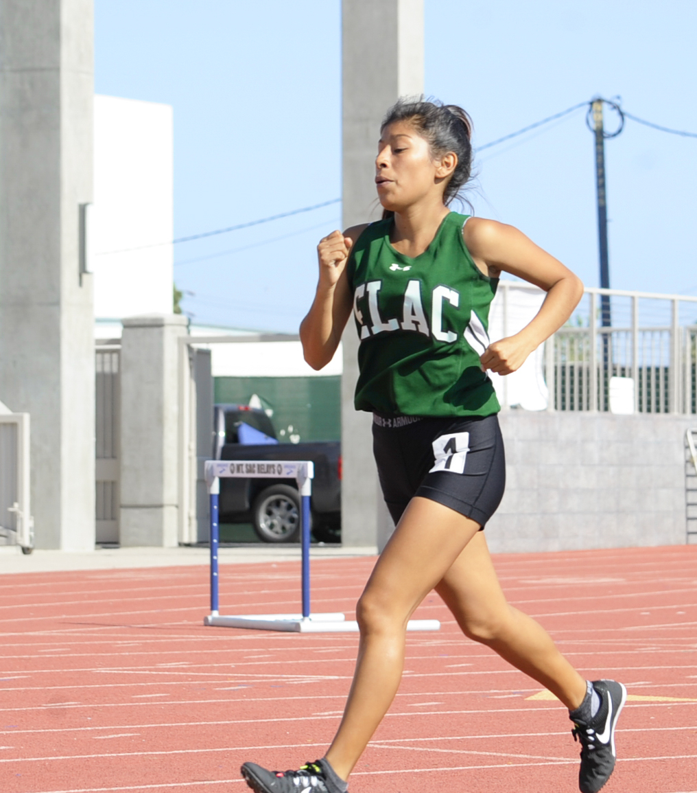 East Los Angeles College freshman Jazmin Romero was not intimidated today in the Long Beach State Invitational, a meet including more than 2,200 athletes as she ran a personal record in the 800-meter run. (Photo by Tadzio Garcia)