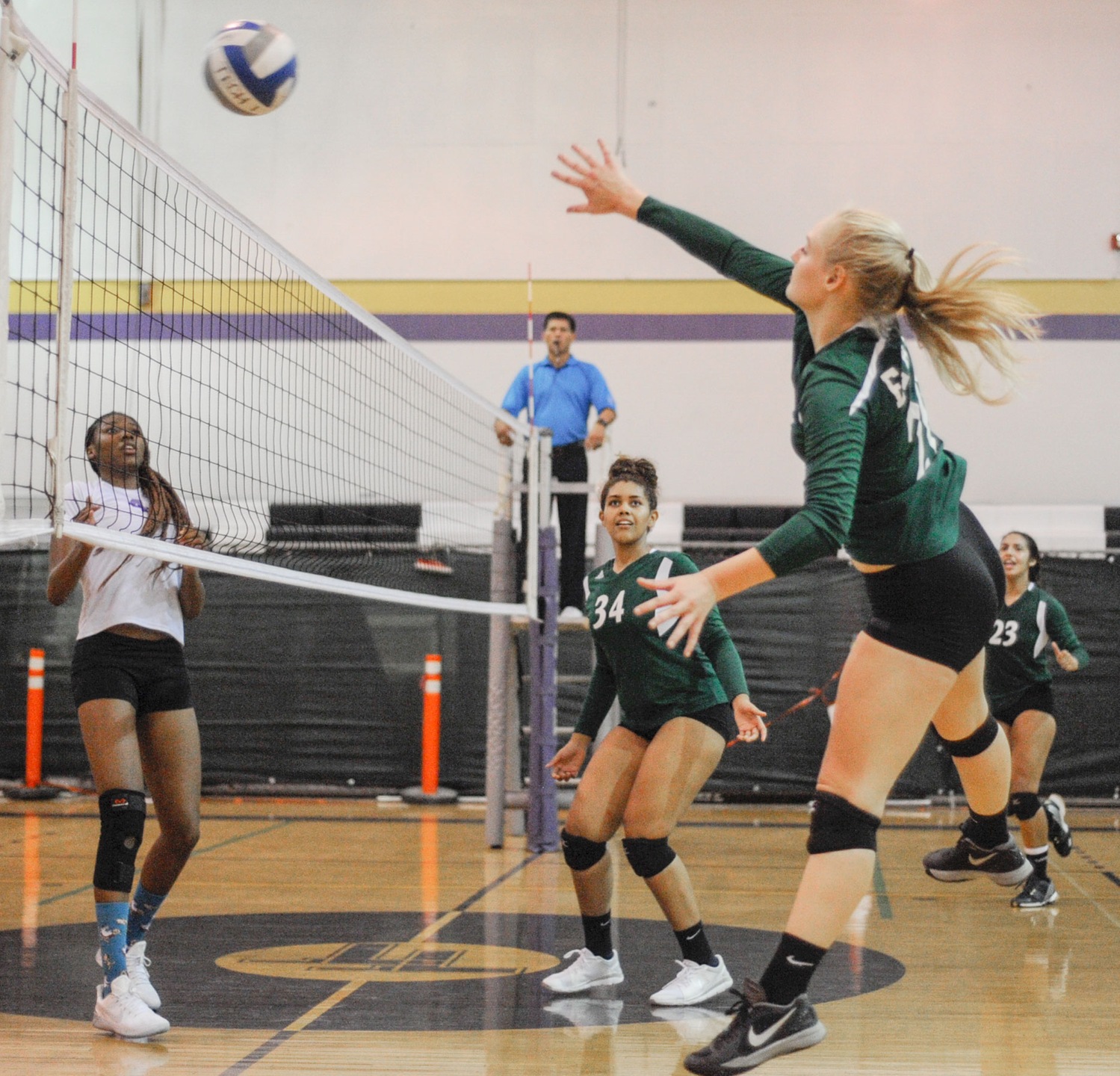 East Los Angeles College outside hitter Makkena Ryan attempts a kill as freshman middle hitter Kayla Dickerson looks on in a 3-0 win over LA Trade Tech. (Photo by Tadzio Garcia)