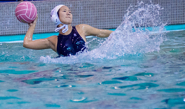 East Los Angeles College sophomore Yvonne Young powers an outside shot in a 16-4 water polo win against El Camino College. (Photo by Tadzio Garcia)