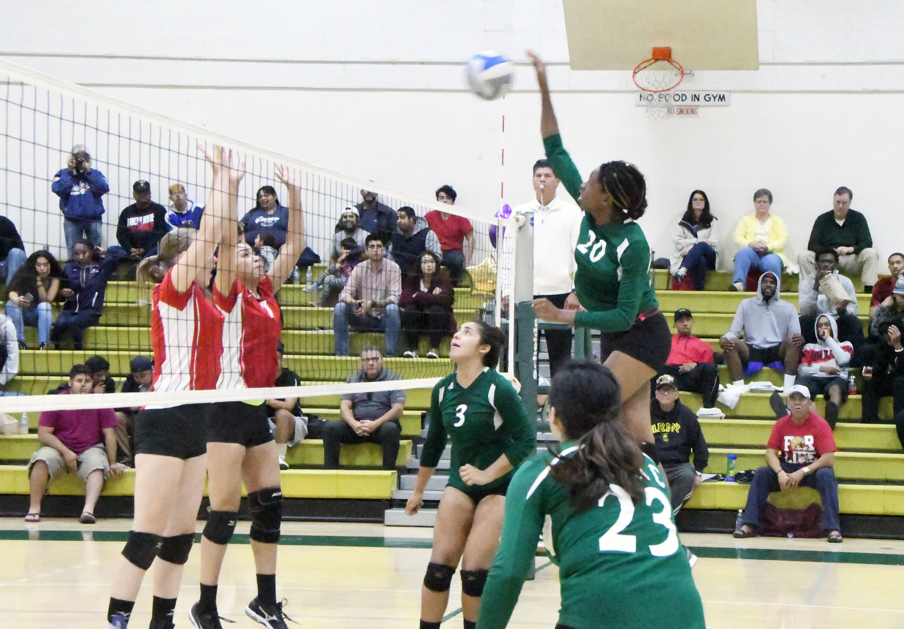 East Los Angeles College freshman Esther Duru attempts one of her 28 game-high kills in a 3-1 win vs. Chaffey College on Sophomore Night. (Photo by DeeDee Jackson)